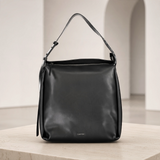 Bolso de hombro Calvin Klein — El negro gana altura
