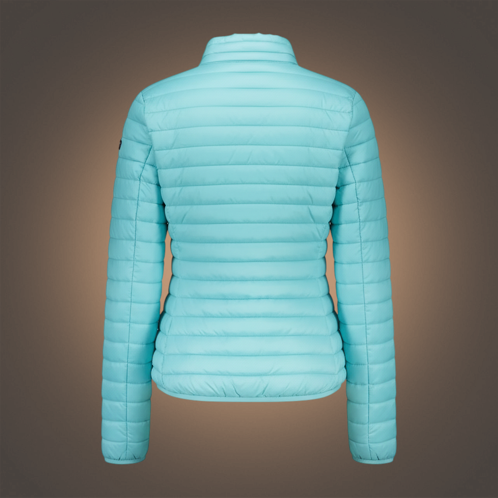 Vista trasera de chaqueta acolchada ligera color turquesa para mujer de la marca liquidationlive Norway 1963