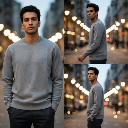 Jersey de punto gris Harmont & Blaine con cuello redondo y logo bordado, lucido por un hombre en una calle urbana
