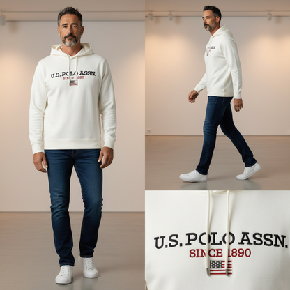 Hombre con sudadera blanca con capucha U.S. Polo Assn. y logo bordado, combinada con vaqueros oscuros y zapatillas
